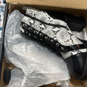 Snake black and white boots size 11. Brand new never worn.